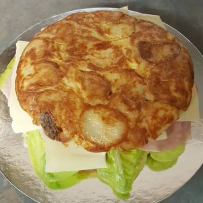 Spanish Omelette Filled With Ham Cheese Lettuce